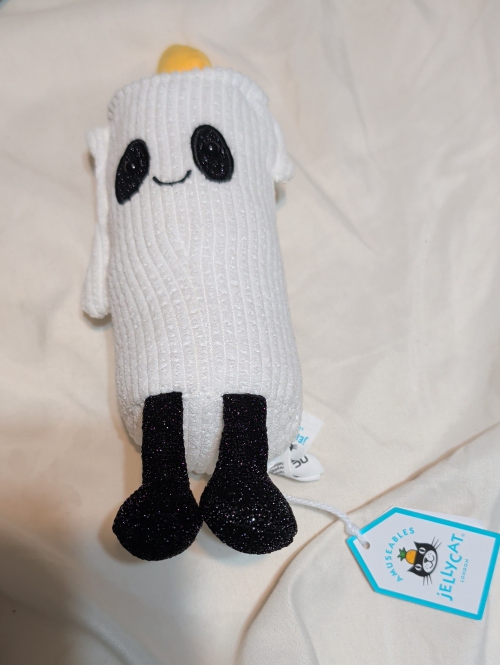 Jellycat White Plush Flickety Candle with Black Glitter Feet and Yellow Top